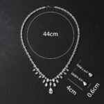 Wholesale bridal zircon set with large oval pendant and matching earrings on real gold plated copper from JuneJewelry.com – premium wedding jewelry for bulk orders.