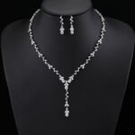 Wholesale copper zircon jewelry set with marquise-cut stones and real gold plating from JuneJewelry.com – luxury bridal accessories for bulk orders.