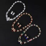 Wholesale oval zircon set with crisscross link necklace and 925 silver needle earrings from JuneJewelry.com – luxury gold plated bridal jewelry.