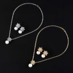 Wholesale snowflake jewelry set with shell pearls and zircon stones on 18K gold plated copper from JuneJewelry.com – luxury 925 silver needle bridal jewelry.