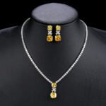 Wholesale Copper Zircon Set featuring a luxury necklace and earrings with 925 silver pins and real gold plating from JuneJewelry.com.