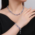 Wholesale copper zircon jewelry set with a heavy crystal necklace and 925 silver needle earrings from JuneJewelry.com – luxury bridal jewelry for bulk orders.