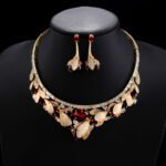 Luxury Wholesale Zircon Set featuring elegant teardrop and cushion cut zircons on gold plated copper base from JuneJewelry.com.