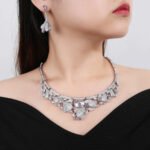 Luxury Wholesale Zircon Set featuring elegant teardrop and cushion cut zircons on gold plated copper base from JuneJewelry.com.