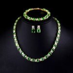 Wholesale luxury zircon set with emerald cut radiant stones and gold plated copper from JuneJewelry.com – 925 silver needle jewelry.