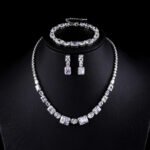 Wholesale luxury zircon set with necklace, bracelet, and S925 silver needle earrings from JuneJewelry.com – premium gold plated bridal jewelry.