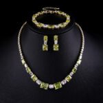 Wholesale luxury zircon set with necklace, bracelet, and S925 silver needle earrings from JuneJewelry.com – premium gold plated bridal jewelry.