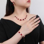 Wholesale luxury zircon set with necklace, bracelet, and S925 silver needle earrings from JuneJewelry.com – premium gold plated bridal jewelry.