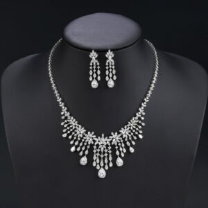 Wholesale platinum zircon set featuring a teardrop pendant and matching earrings in silver-tone copper from JuneJewelry.com – luxury wedding jewelry for bulk orders.