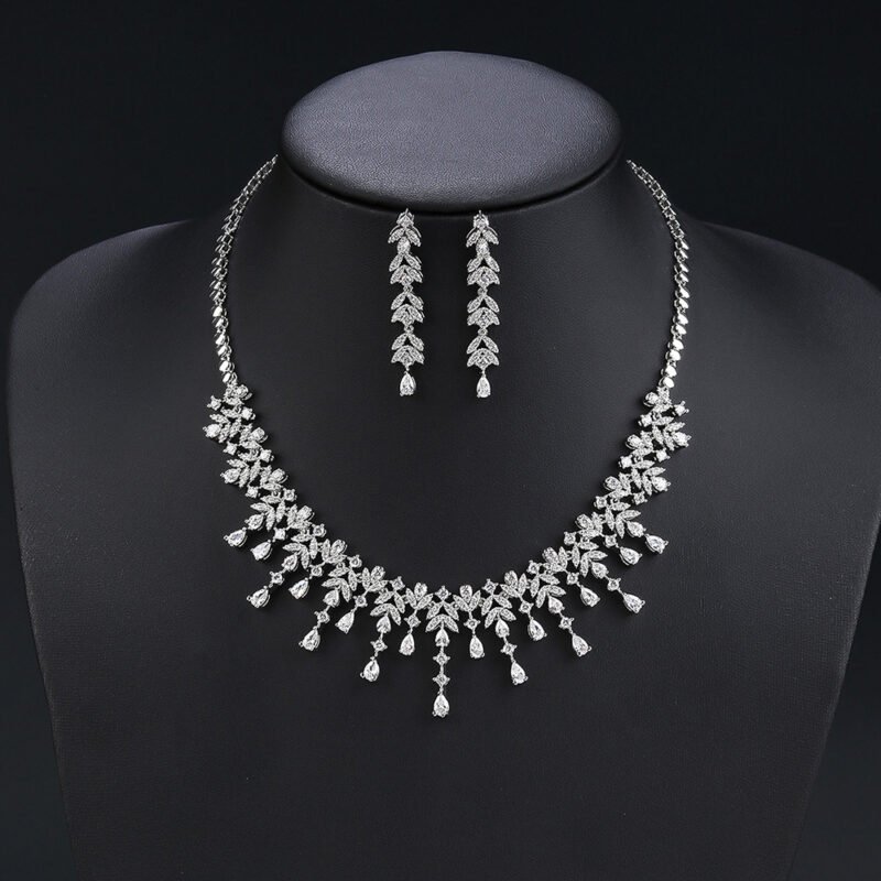 Wholesale zircon jewelry set with platinum plated copper and brilliant marquise stones from JuneJewelry.com – luxury bridal accessories for bulk orders.