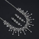 Wholesale zircon jewelry set with platinum plated copper and brilliant marquise stones from JuneJewelry.com – luxury bridal accessories for bulk orders.