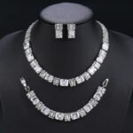 Wholesale radiant zircon set with emerald cut stones and gold plated copper from JuneJewelry.com – luxury 925 silver needle bridal jewelry.