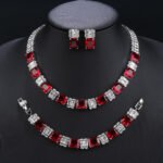 Wholesale radiant zircon set with emerald cut stones and gold plated copper from JuneJewelry.com – luxury 925 silver needle bridal jewelry.