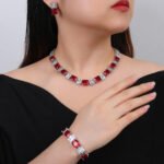 Wholesale radiant zircon set with emerald cut stones and gold plated copper from JuneJewelry.com – luxury 925 silver needle bridal jewelry.