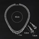 Wholesale elegant zircon set with teardrop pendants and platinum plated copper from JuneJewelry.com – luxury wedding jewelry for bulk purchase.