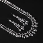 Wholesale elegant zircon set with teardrop pendants and platinum plated copper from JuneJewelry.com – luxury wedding jewelry for bulk purchase.