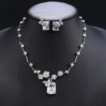 Wholesale floral zircon set with emerald-cut pendants and gold plated copper from JuneJewelry.com – 925 silver needle bridal jewelry.