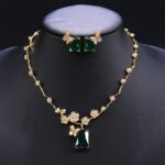 Wholesale floral zircon set with emerald-cut pendants and gold plated copper from JuneJewelry.com – 925 silver needle bridal jewelry.