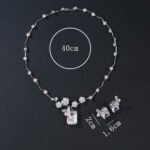 Wholesale floral zircon set with emerald-cut pendants and gold plated copper from JuneJewelry.com – 925 silver needle bridal jewelry.