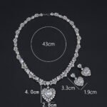 Wholesale cubic zirconia set with oval and pear-cut stones on real gold plated copper base from JuneJewelry.com – luxury bridal jewelry for bulk orders.