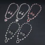 Wholesale cubic zirconia set with oval and pear-cut stones on real gold plated copper base from JuneJewelry.com – luxury bridal jewelry for bulk orders.