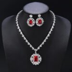 Elevate your luxury collection with our Wholesale Bridal Zircon Set, designed specifically for premium wedding boutiques and retailers. We utilize high-grade copper as the durable foundation for these shimmering necklace and earring ensembles. Our skilled artisans apply genuine gold plating to ensure a long-lasting, brilliant white gold finish. Each piece sparkles with hand-set AAA grade cubic zircon stones that capture light from every angle. We include hypoallergenic 925 silver needles on all earrings to protect your customers' sensitive skin. Exquisite Original Designs for Grand Occasions The Wholesale Bridal Zircon Set represents the pinnacle of original craftsmanship for formal gala events. We feature intricate geometric patterns and teardrop accents in these unique jewelry combinations. These sets offer a sophisticated aesthetic that rivals fine diamond jewelry at a fraction of the cost. Your clients will love the heavy, high-quality feel of these stunning accessories. We create these designs to help your brand stand out in the competitive bridal market. Maximize Profits with Direct Factory Pricing At JuneJewelry.com, we provide the Wholesale Bridal Zircon Set at unbeatable factory-direct prices. Our professional manufacturing process ensures that you receive high-quality goods for your bulk orders. We eliminate middleman fees to help you achieve significantly higher profit margins on every sale. This jewelry is perfect for cross-border e-commerce sellers on platforms like Amazon or Shopify. You can trust our consistent quality and unique style to keep your inventory moving quickly. Global Free Shipping and Professional Support Ordering our Wholesale Bridal Zircon Set is completely worry-free thanks to our global free shipping policy. We ship your items securely to ensure they arrive in perfect condition at your doorstep. Our team is dedicated to supporting jewelry wholesalers and online influencers with reliable supply chains. We focus on providing trendy, high-end pieces that resonate with modern fashion lovers. Partner with JuneJewelry today to expand your business with the finest zircon jewelry sets available.