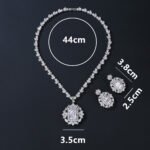 Elevate your luxury collection with our Wholesale Bridal Zircon Set, designed specifically for premium wedding boutiques and retailers. We utilize high-grade copper as the durable foundation for these shimmering necklace and earring ensembles. Our skilled artisans apply genuine gold plating to ensure a long-lasting, brilliant white gold finish. Each piece sparkles with hand-set AAA grade cubic zircon stones that capture light from every angle. We include hypoallergenic 925 silver needles on all earrings to protect your customers' sensitive skin. Exquisite Original Designs for Grand Occasions The Wholesale Bridal Zircon Set represents the pinnacle of original craftsmanship for formal gala events. We feature intricate geometric patterns and teardrop accents in these unique jewelry combinations. These sets offer a sophisticated aesthetic that rivals fine diamond jewelry at a fraction of the cost. Your clients will love the heavy, high-quality feel of these stunning accessories. We create these designs to help your brand stand out in the competitive bridal market. Maximize Profits with Direct Factory Pricing At JuneJewelry.com, we provide the Wholesale Bridal Zircon Set at unbeatable factory-direct prices. Our professional manufacturing process ensures that you receive high-quality goods for your bulk orders. We eliminate middleman fees to help you achieve significantly higher profit margins on every sale. This jewelry is perfect for cross-border e-commerce sellers on platforms like Amazon or Shopify. You can trust our consistent quality and unique style to keep your inventory moving quickly. Global Free Shipping and Professional Support Ordering our Wholesale Bridal Zircon Set is completely worry-free thanks to our global free shipping policy. We ship your items securely to ensure they arrive in perfect condition at your doorstep. Our team is dedicated to supporting jewelry wholesalers and online influencers with reliable supply chains. We focus on providing trendy, high-end pieces that resonate with modern fashion lovers. Partner with JuneJewelry today to expand your business with the finest zircon jewelry sets available.