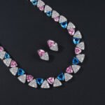 Wholesale triangle zircon set with radiant white stones and gold plated copper from JuneJewelry.com – luxury 925 silver needle bridal jewelry.