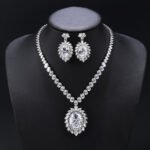 Wholesale Copper Zircon Jewelry Set with sparkling zircon main stones, true gold plated finish on copper, from JuneJewelry.com – high quality, unique fashion jewelry for bulk purchase.