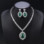 Wholesale Copper Zircon Jewelry Set with sparkling zircon main stones, true gold plated finish on copper, from JuneJewelry.com – high quality, unique fashion jewelry for bulk purchase.