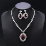 Wholesale Copper Zircon Jewelry Set with sparkling zircon main stones, true gold plated finish on copper, from JuneJewelry.com – high quality, unique fashion jewelry for bulk purchase.