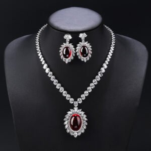 Wholesale Copper Zircon Jewelry Set with sparkling zircon main stones, true gold plated finish on copper, from JuneJewelry.com – high quality, unique fashion jewelry for bulk purchase.