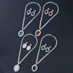 Wholesale Copper Zircon Jewelry Set with sparkling zircon main stones, true gold plated finish on copper, from JuneJewelry.com – high quality, unique fashion jewelry for bulk purchase.