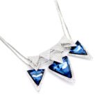 Three horizontal Swarovski element triangle crystals on a medium-large geometric pendant necklace in white gold plated copper from junejewelry.com.