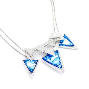 Three horizontal Swarovski element triangle crystals on a medium-large geometric pendant necklace in white gold plated copper from junejewelry.com.