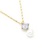 Modern square Swarovski element crystal and white pearl pendant necklace in gold and platinum plated copper for wholesale on junejewelry.com.