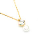 Modern square Swarovski element crystal and white pearl pendant necklace in gold and platinum plated copper for wholesale on junejewelry.com.