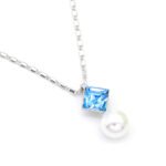 Modern square Swarovski element crystal and white pearl pendant necklace in gold and platinum plated copper for wholesale on junejewelry.com.