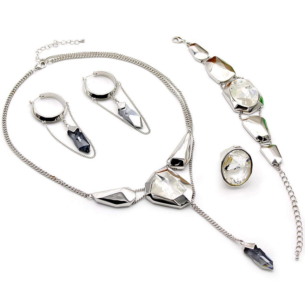 Unique irregular white Swarovski element crystal jewelry set with necklace, earrings, ring, and bracelet for wholesale.
