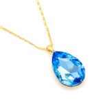 Elegant teardrop-shaped Swarovski element crystal pendant necklace with white gold plating, available for fashion jewelry wholesale at junejewelry.com.