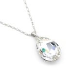 Elegant teardrop-shaped Swarovski element crystal pendant necklace with white gold plating, available for fashion jewelry wholesale at junejewelry.com.