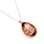 Elegant teardrop-shaped Swarovski element crystal pendant necklace with white gold plating, available for fashion jewelry wholesale at junejewelry.com.