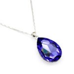 Elegant teardrop-shaped Swarovski element crystal pendant necklace with white gold plating, available for fashion jewelry wholesale at junejewelry.com.
