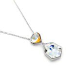 Wholesale Swarovski element hexagon necklace in gold and white gold plating, geometric crystal pendant for daily wear, JuneJewelry original design.