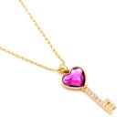 Wholesale Swarovski element heart key necklace: heart-shaped crystal key pendant on a high-quality real gold plated copper chain.