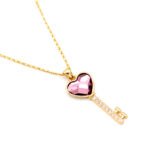 Wholesale Swarovski element heart key necklace: heart-shaped crystal key pendant on a high-quality real gold plated copper chain.