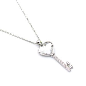 Wholesale Swarovski element heart key necklace: heart-shaped crystal key pendant on a high-quality real gold plated copper chain.