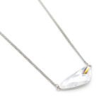 Dainty irregular Swarovski element crystal necklace in gold and white gold plated copper for wholesale fashion jewelry.