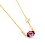 Elegant oval shaped Swarovski element crystal pendant necklace in real gold plated copper for wholesale at junejewelry.com.