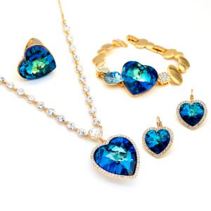 Wholesale Swarovski element heart jewelry set: crystal necklace, heart earrings, adjustable ring, and bracelet in real gold plated copper.